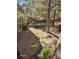 Landscaped courtyard with trees and brick pathway at 2200 S Fort Apache Rd # 2050, Las Vegas, NV 89117