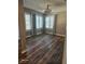 Dining room with wood-look floors and window shutters at 2200 S Fort Apache Rd # 2050, Las Vegas, NV 89117