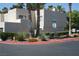 Condo building with landscaping and street view at 2616 Aracatuba Ave, Las Vegas, NV 89121