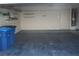 Attached garage with overhead storage and ample space for vehicles at 2616 Aracatuba Ave, Las Vegas, NV 89121