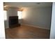 Living room with fireplace and wood-look floors at 2616 Aracatuba Ave, Las Vegas, NV 89121