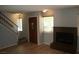 Living room with fireplace and wood-look floors at 2616 Aracatuba Ave, Las Vegas, NV 89121