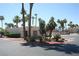 Community pool area with palm trees, a relaxing atmosphere, and ample parking at 2616 Aracatuba Ave, Las Vegas, NV 89121