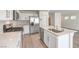 Modern kitchen with stainless steel appliances and an island at 2642 Snapdragon Falls Ave # 93, North Las Vegas, NV 89081