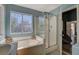 Bathroom with shower and separate tub at 2715 Coral Cliffs Ct, North Las Vegas, NV 89031