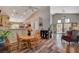 Bright dining room with a wood table and hardwood floors at 2715 Coral Cliffs Ct, North Las Vegas, NV 89031