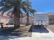 Charming curb appeal with a travel trailer in the driveway at 2715 Coral Cliffs Ct, North Las Vegas, NV 89031