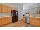 Bright kitchen with stainless steel appliances and wood cabinets at 2715 Coral Cliffs Ct, North Las Vegas, NV 89031