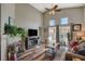 Relaxing living room with fireplace and pool view at 2715 Coral Cliffs Ct, North Las Vegas, NV 89031