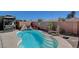 Enjoy this refreshing kidney-shaped pool with a waterfall feature at 2715 Coral Cliffs Ct, North Las Vegas, NV 89031