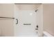 Clean bathroom with tub, shower, and grab bars at 2768 Liberation Dr, Henderson, NV 89044