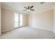 Bedroom with carpet flooring and private balcony access at 2768 Liberation Dr, Henderson, NV 89044