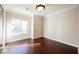 Bright bedroom with hardwood floors and large window at 2768 Liberation Dr, Henderson, NV 89044