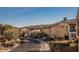 View of the community with houses and mountain views at 2768 Liberation Dr, Henderson, NV 89044