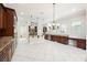 Spacious kitchen with an island, stainless steel appliances, and hardwood cabinets at 2768 Liberation Dr, Henderson, NV 89044