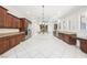 Large kitchen featuring stainless steel appliances and dark wood cabinetry at 2768 Liberation Dr, Henderson, NV 89044