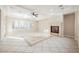 Bright living room with a tile floor and fireplace at 2768 Liberation Dr, Henderson, NV 89044