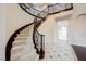 Stunning curved staircase, wrought iron railing at 2768 Liberation Dr, Henderson, NV 89044