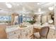 Vanity area with marble countertop and gold fixtures at 3074 Monte Rosa Ave, Las Vegas, NV 89120