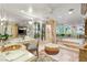 Large bathroom with marble flooring and a luxurious bathtub at 3074 Monte Rosa Ave, Las Vegas, NV 89120