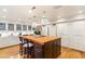 Eat-in kitchen with large butcher block island and white cabinetry at 3074 Monte Rosa Ave, Las Vegas, NV 89120