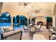 Outdoor kitchen and dining area under covered patio at 3074 Monte Rosa Ave, Las Vegas, NV 89120