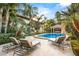 Resort-style pool with lounge chairs and gazebo at 3074 Monte Rosa Ave, Las Vegas, NV 89120