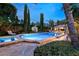 Large pool with spa and surrounding landscaping at 3074 Monte Rosa Ave, Las Vegas, NV 89120