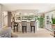 Basement wet bar with granite countertop and glass shelving at 3074 Monte Rosa Ave, Las Vegas, NV 89120