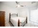 Bright bedroom with ceiling fan and wooden floors at 3096 Beaux Art Ave, Henderson, NV 89044