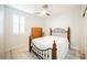 Bedroom with ceiling fan, wood floors, and a queen bed at 3096 Beaux Art Ave, Henderson, NV 89044