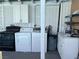 Outdoor laundry area with washer, dryer, and extra sink at 3712 San Joaquin Ave, Las Vegas, NV 89102