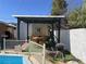 Backyard patio with pergola, grill, and pool view at 3712 San Joaquin Ave, Las Vegas, NV 89102