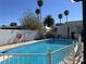 Sparkling blue pool with safety fence at 3712 San Joaquin Ave, Las Vegas, NV 89102