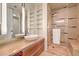 Stylish bathroom featuring a modern vanity with a vessel sink, and a glass enclosed shower at 3726 Las Vegas Blvd # 2702, Las Vegas, NV 89158