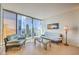 Bright living room with city views and comfortable seating at 3726 Las Vegas Blvd # 2702, Las Vegas, NV 89158