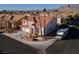 Two-story house with tile roof, large yard, and mountain views at 3925 Larkcrest St, Las Vegas, NV 89129