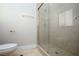 Bathroom with tiled shower and toilet at 3925 Larkcrest St, Las Vegas, NV 89129