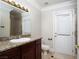 Bathroom with granite vanity and tiled shower at 3925 Larkcrest St, Las Vegas, NV 89129