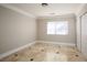 Bright bedroom featuring tile floors and a window at 3925 Larkcrest St, Las Vegas, NV 89129