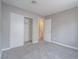 This is a simple bedroom with gray carpet, walls, and white trim. Also a closet and door at 414 Maritocca Ave, North Las Vegas, NV 89031