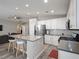 Modern kitchen featuring white cabinets and a large island at 414 Maritocca Ave, North Las Vegas, NV 89031