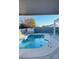 Inviting blue swimming pool with a covered patio area at 414 Maritocca Ave, North Las Vegas, NV 89031