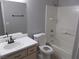 Clean bathroom, featuring a bathtub and vanity with sink at 4522 Checker Way, North Las Vegas, NV 89031