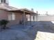 Covered patio area with spacious backyard at 4522 Checker Way, North Las Vegas, NV 89031