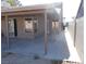 Spacious patio with covered area and access to the house at 4522 Checker Way, North Las Vegas, NV 89031