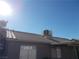 Rear view of house showing roofline and AC unit at 4522 Checker Way, North Las Vegas, NV 89031