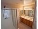 Double sink bathroom with a shower and separate tub at 5066 El Castano Ave, Las Vegas, NV 89108