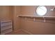 Large walk-in closet with shelving and window at 5066 El Castano Ave, Las Vegas, NV 89108