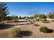 Landscaped community with walking paths and desert plants at 5066 El Castano Ave, Las Vegas, NV 89108